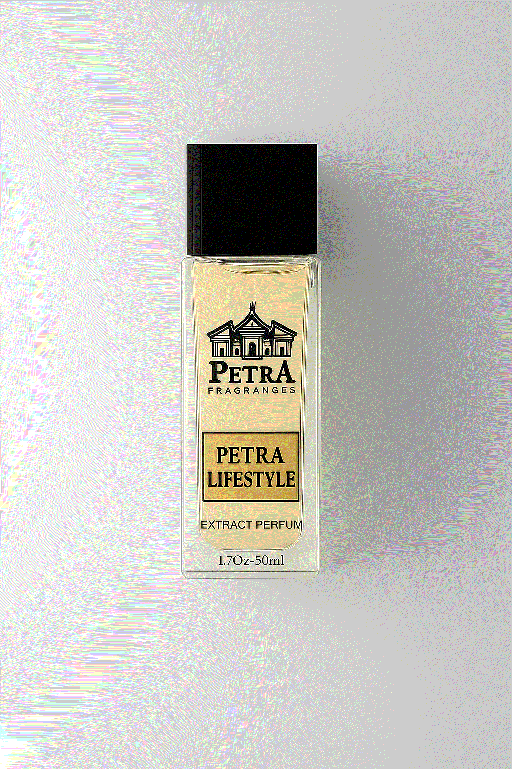 Petra Lifestyle amber vanilla fragrance bottle with black cap and elegant logo design