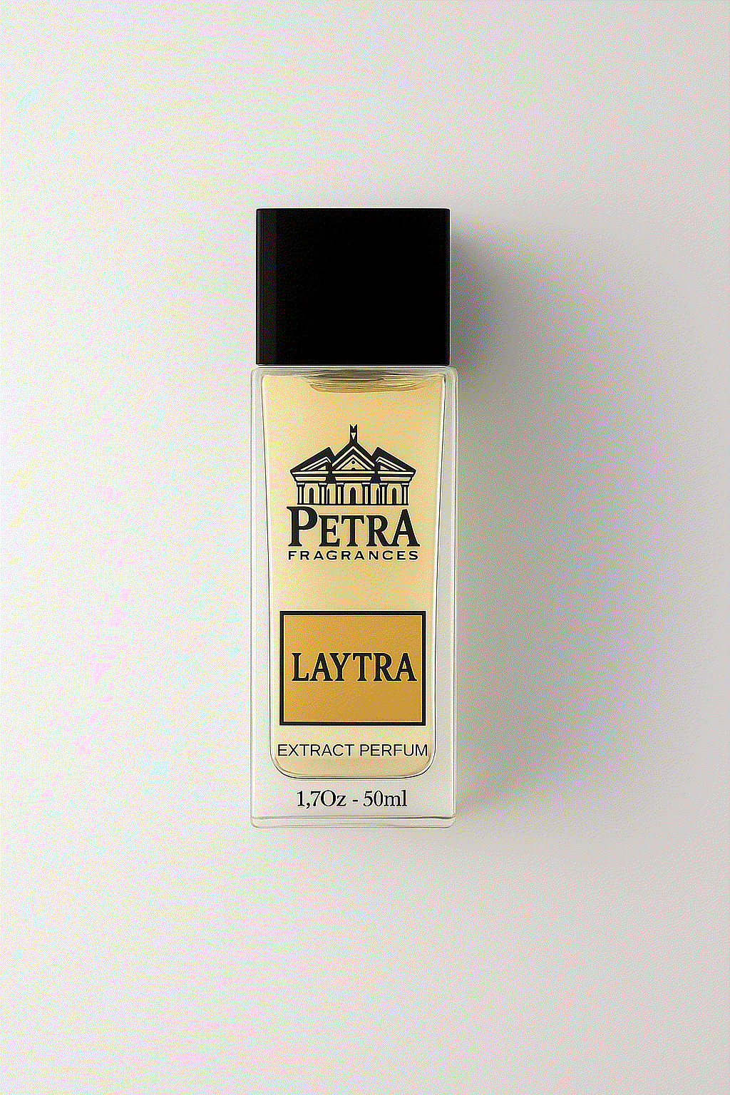 LAYTRA by Petrafragrance extract perfume bottle with black cap on white background, spicy fragrance with apple, lavender, vanilla, woods, and spice notes.